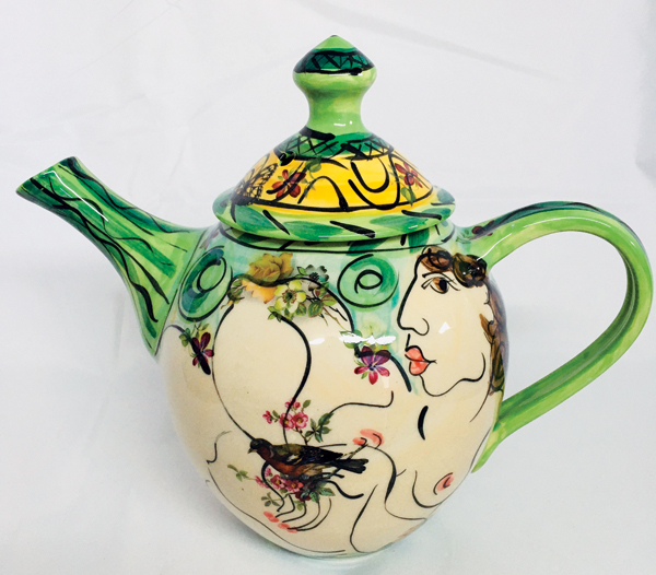 3 Karen Atherley’s Green Figurative Teapot, 9¾ in. (25 cm) in length, earthenware. Photo: Olivia Warren. 