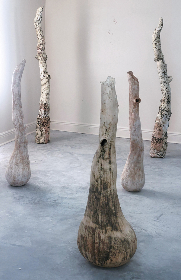 6 Roots Series, installation view, fired clay with copper-carbonate wash, 2022. 