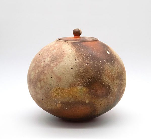1 Globe, 15 in. (38 cm) in height, soda-fired stoneware.
