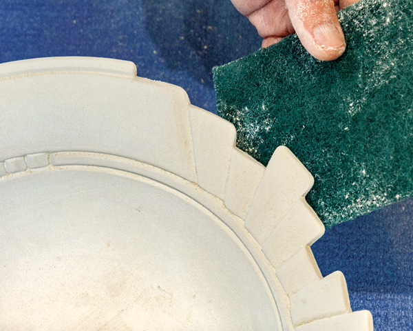 5 Use a green kitchen scouring pad to refine the edges of the rim and to soften any sharp points.