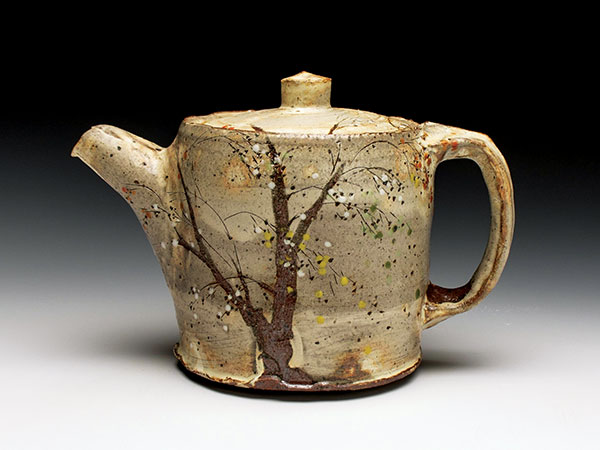 4 Teapot, 8 in. (20 cm) in length, wheel-thrown stoneware, white slip, clear and multiple colored glazes, reduction fired to cone 10 in a gas kiln.