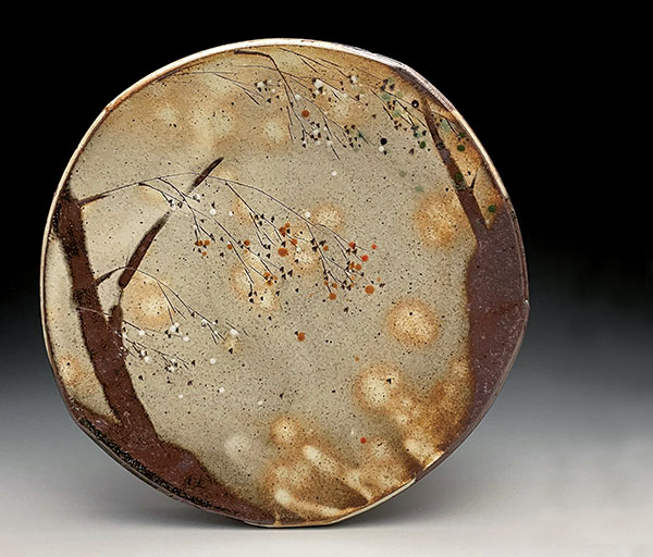 8 Dinner plate, 103/4 in. (27 cm) in diameter, wheel-thrown stoneware, white slip, clear and multiple colored glazes, reduction fired to cone 10 in a gas kiln.
