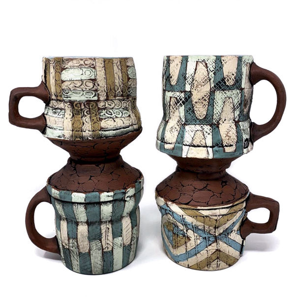 4 Mugs, to 5 in. (13 cm) in height, red clay, colored terra sigillata, underglaze, glaze, fired in an electric kiln to cone 4.