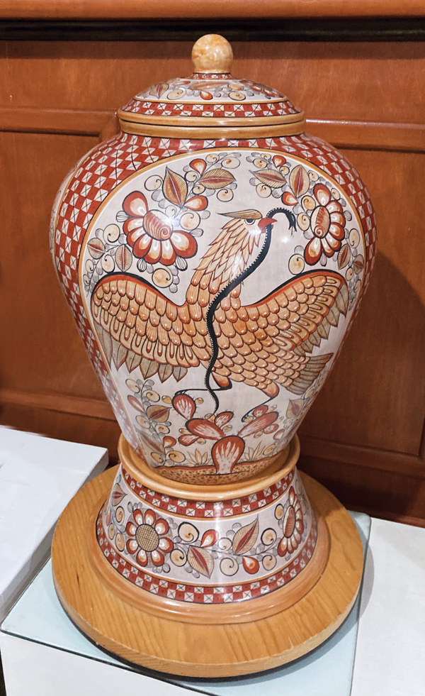 4 Large pedestal covered jar with Mexican eagle and snake figures (Nahuals on the reverse), 27 in. (69 cm) in height, local clay and slip, colorants, stains, burnishing. 