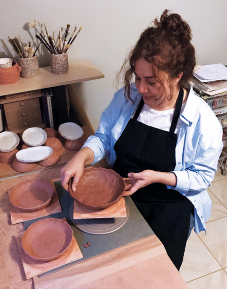 Didem Firat making pinch-formed bowls. Photo: Hüma Önal.