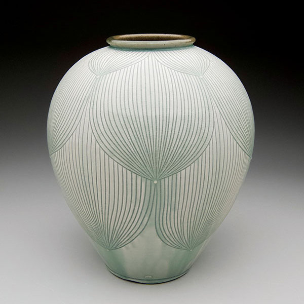 13 Adam Field’s vase, 17 in. (43 cm) in height, stoneware, porcelain slip, carved pattern, 2017.