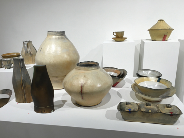 Grouping of Tom Jaszczak’s vessels, to 18 in. (46 cm) in height, wheel-thrown, altered, and handbuilt earthenware, fired in a soda kiln to cone 3.