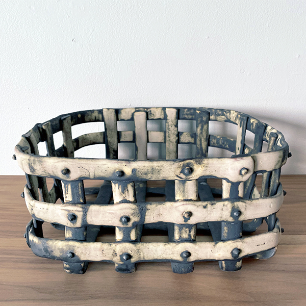 Square basket, 15 in. (38 cm) in length, handbuilt earthenware, oxides, steel nails, 2020.