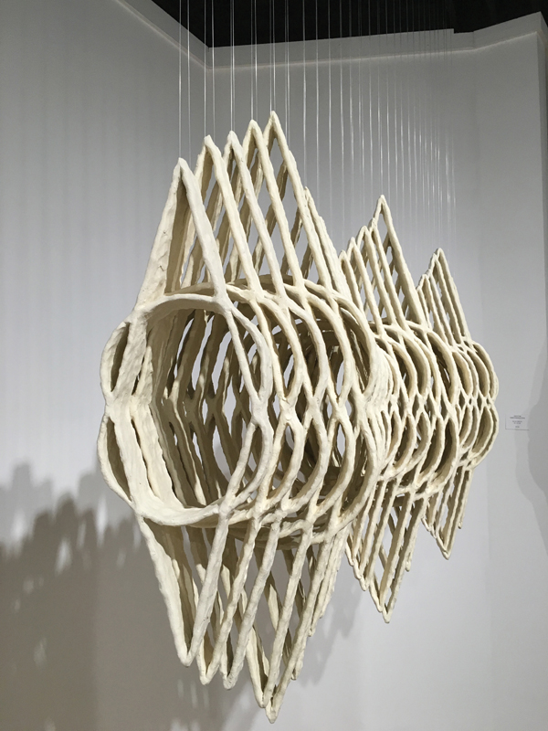 Joanna Poag’s Untitled III (Equilibrium Series), 36 in. (91 cm) in height, fired clay, fishing line.