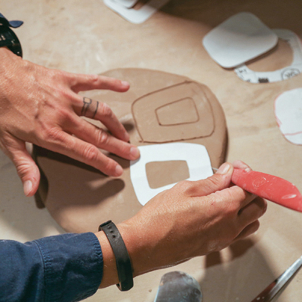 6 Using a needle tool, trace both the exterior and interior lines of the handle form.