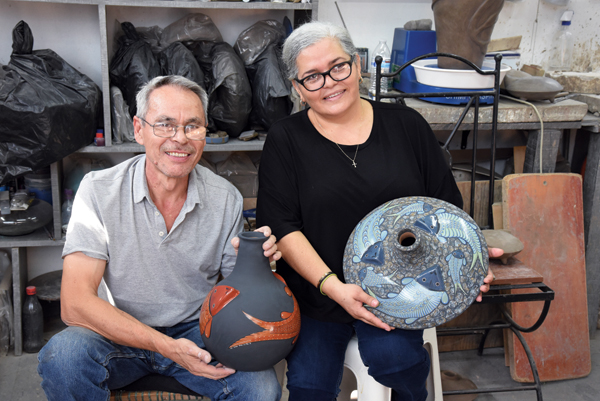 1 Luis and Irma Cortez, pictured in their studio. 