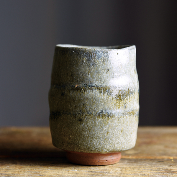 6 Wavy rimmed cup; 4 in. (10 cm) in height; wild stoneware; glaze composed of granite, wood ash, and clay; reduction fired to cone 10, 2021. 