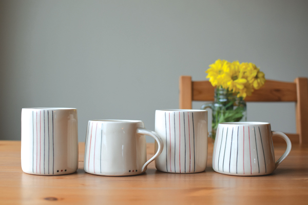 Striped cups and mugs, 4 in. (9 cm) in height, Grolleg porcelain, 2016.