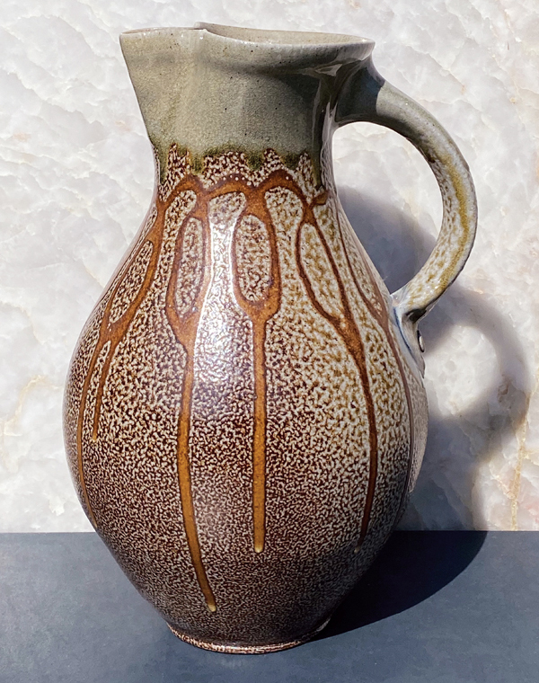 6 Mark Hewitt’s pitcher, 13 in. (33 cm) in height, looping kaolin slip swags and ash-glazed neck, wood-fired salt glaze, 2020. 