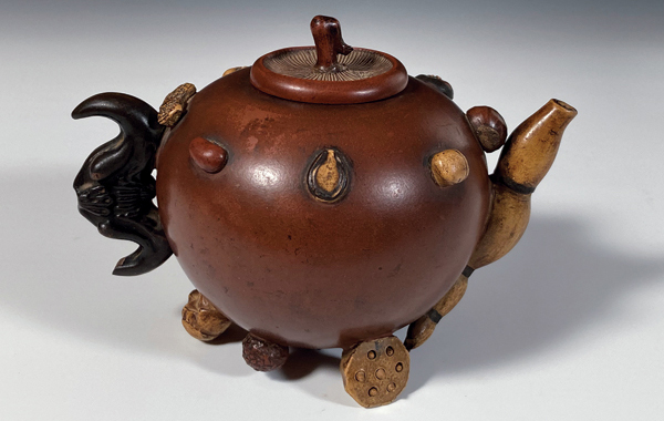 3 Ji’an (Qu Yingshao)’s One Hundred Seeds Teapot, 7 in. (18 cm) in length, stoneware, ca. 1742–1823. 