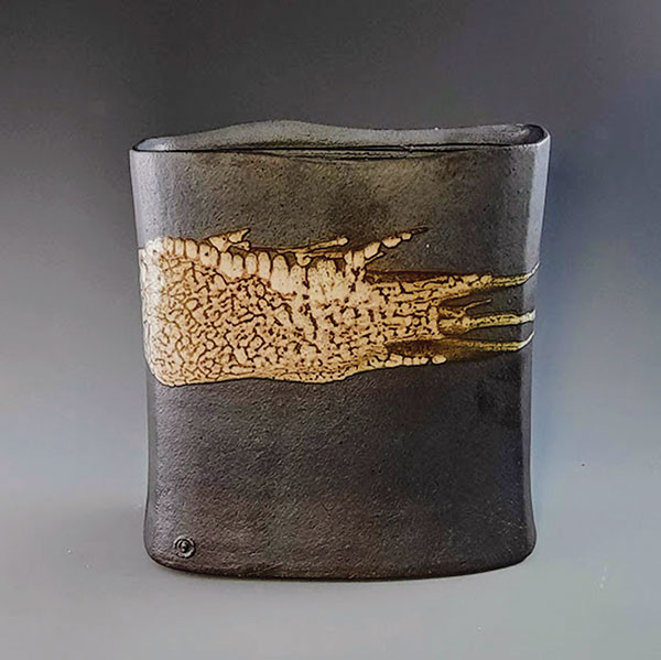 1 Reid Ozaki’s Nezumi Shino Glaze Vase, 9½ in. (24 cm) in height, wheel-thrown and altered stoneware with slab bottom, slip, shino glaze, fired in reduction to cone 10 in a gas kiln, 2021. 