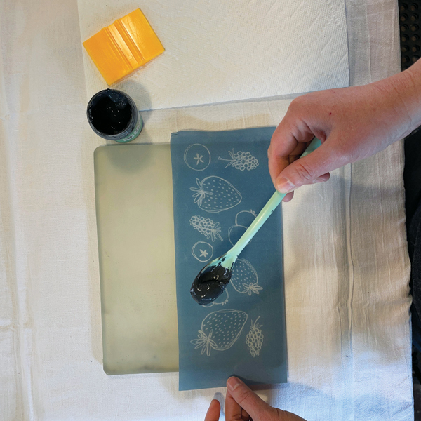 1 Place the silkscreen onto the Gelli plate and apply the thickened underglaze.