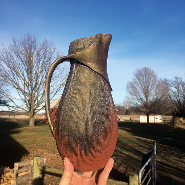 3 Brian Chen’s zarfed pitcher, 11 in. (28 cm) in height, wood-fired red stoneware, 2020.