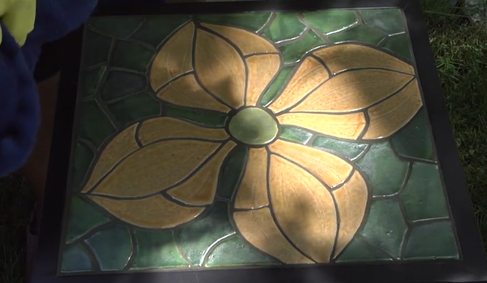 Image of a finished ceramic mosaic tabletop made by Angelica Pozo.