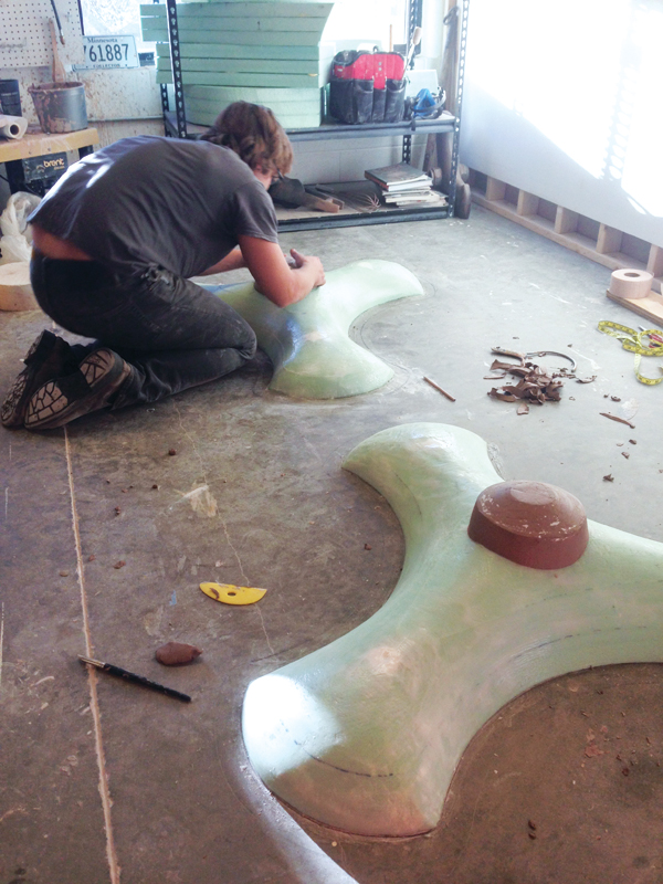 3 Creating a full-scale model of one of the tiller forms in dense insulating foam and clay. Each half of the tiller is modeled separately.