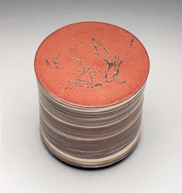 Round box, 5½ in. (14 cm) in height, earthenware, fired in an electric kiln, laser engraving, 2021. Photo: Elizabeth Lamark. 