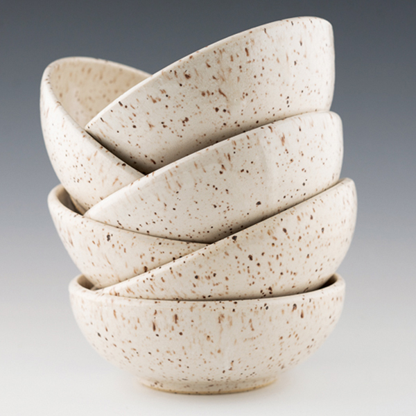 10 Bowls, 6 in. (15 cm) in diameter, classic white glaze on speckled stoneware.