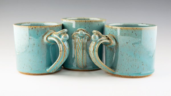 2 Tiffany-blue banded mugs, 3½ in. (9 cm) in height, stoneware, glaze.