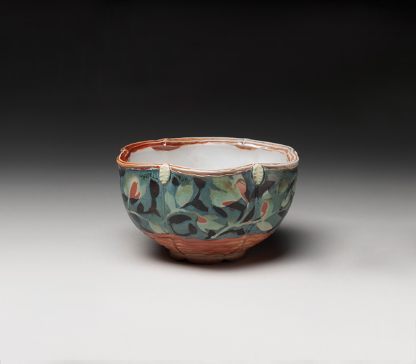 Colleen Riley’s bowl with lobed rim, light-colored stoneware, layered slip, glazes, soda fired.