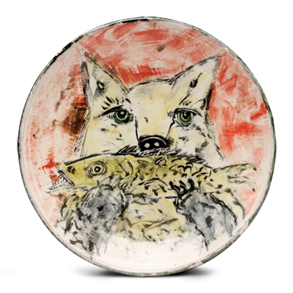 1 Ron Meyers’ Wolf With Fish Plate, 11¼ in. (29 cm) in diameter, earthenware, multiple underglazes, clear glaze, fired in oxidation, 2022. Photo: Schaller Gallery.