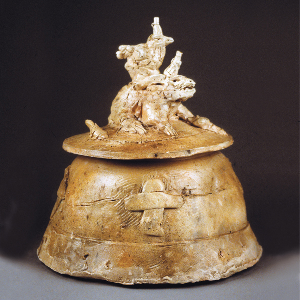 7 Bede Clarke’s lidded jar, 18 in. (46 cm) in height, wheel-thrown and altered earthenware, white slip, bathed in salt brine after bisque firing, tumble stacked in a salt/soda firing to cone 010, 1999.