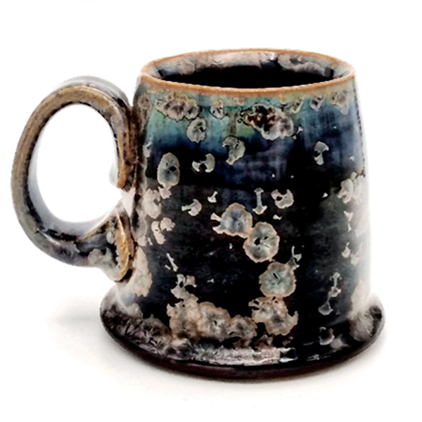 1 A crystalline mug acid-etched, neutralized, and then boiled in water to remove any excess salts left behind from the processes. 
