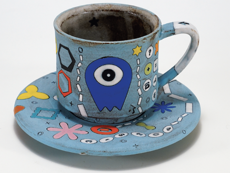 9 Blue One Eyed Alien Americano Cup and Saucer Set, to 5 in. (13 cm) in diameter, stoneware, 2021.