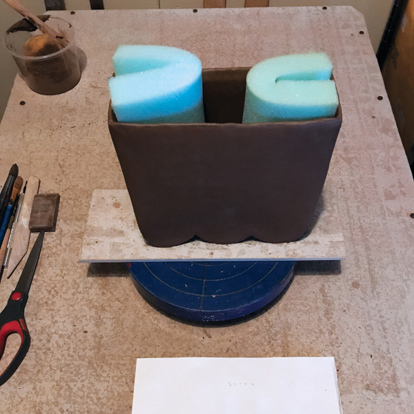 12 Allow the piece to dry slowly, shown here with foam to keep its shape. 