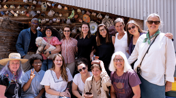 2 Students pose with Guest Faculty Paul Briggs in the kiln yard during their Pinch-forming—A Mindful Approach workshop at Anderson Ranch Arts Center. 