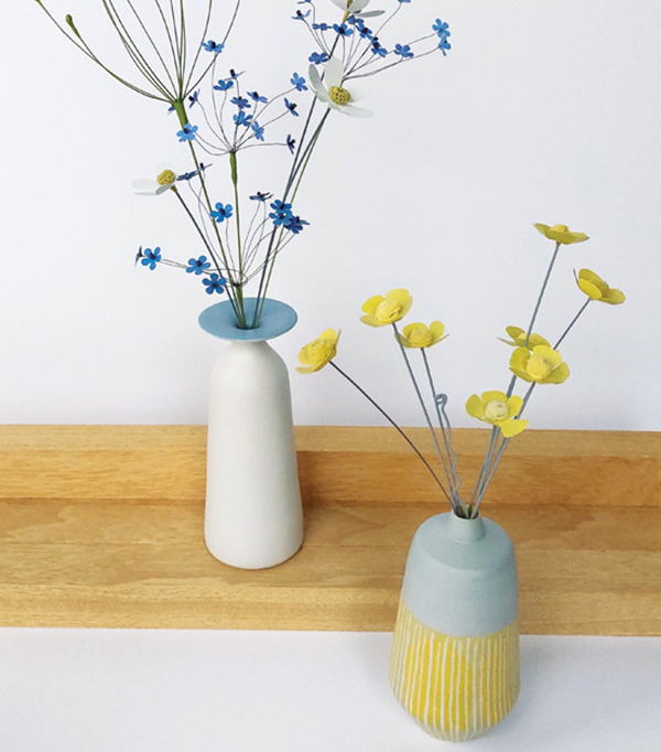 6 Liz Cooksey’s Springtime I and II, to 6 in. (15 cm) in height (vessels only), ceramic, mixed-media wire flowers.