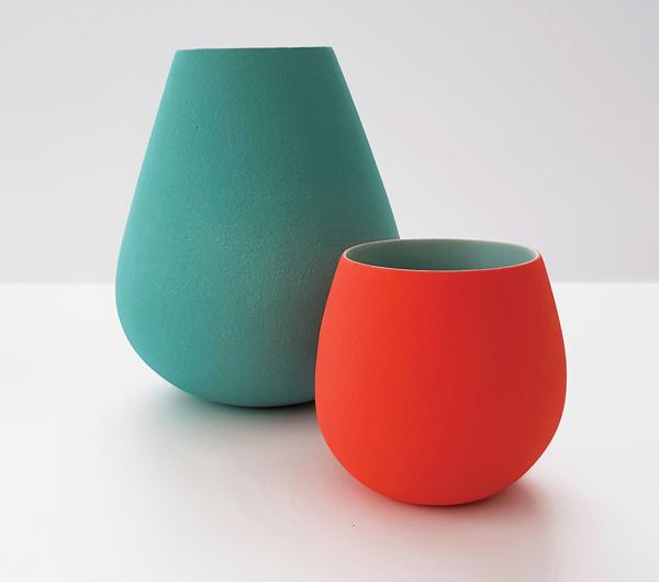 4 Maria Wojdat’s large and small curved vessels, to 6 in. (15 cm) in height, handbuilt earthenware, engobes, high fired.