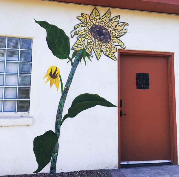 8 Vanessa Alvarado, Jaqueline De La Cruz, Margarita Paz-Pedro, and Jacquelyn Yepa’s Sunflowers Across Burque, 23 square feet (7 square meters), clay, glaze, mortar, grout, and acrylic paint, 2020. Photo: Margarita Paz-Pedro. 