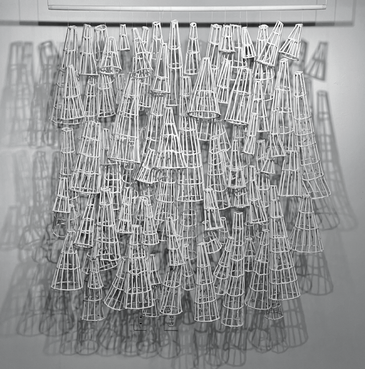 6 Tara Thacker’s Shadow Baskets (Winter) (overall), 7 ft. (2.1 m) in height, porcelain paper clay, fired to cone 6, 2021.