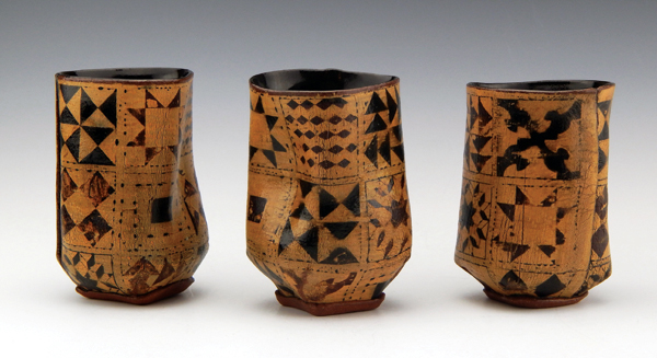 8 Freedom Cups, 4 in. (10 cm), Underground Railroad quilt code printed on handbuilt dark stoneware, underglaze, slip, glaze, cone 6, 2020. 