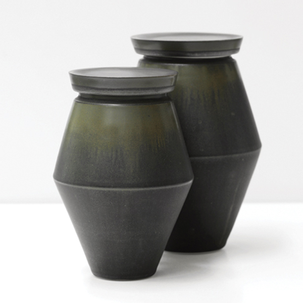 4 Two epilithic urns, to 9 in. (23 cm) in height, porcelain, black iron-oxide glaze, 2021. 
