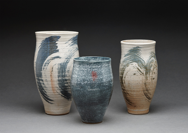 Left to right: Young Jae Lee’s Cylindrical vase, 10.3 in. (26 cm) in height, petalite, feldspar, oak ash glaze with engobe brushwork, stoneware, 2015. Young Jae Lee’s Cylindrical vase, 7.5 in. (19 cm) in height, chalk and nepheline syenite glaze with engobe, stoneware, 2016. Young Jae Lee’s Cylindrical vase, 9.3 in. (24 cm) in height, petalite, feldspar, oak ash glaze with engobe brushwork, stoneware, 2015. Photo: John Davenport.