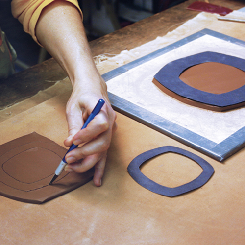 1 Create a pattern, stencil, and foot ring out of paper. Trace and cut the pattern and stencil on a slab. Mark the foot ring.