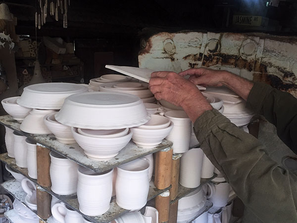 8 The top shelf in the car kiln with tumble-stacked square plates and pie plates on the top layer.