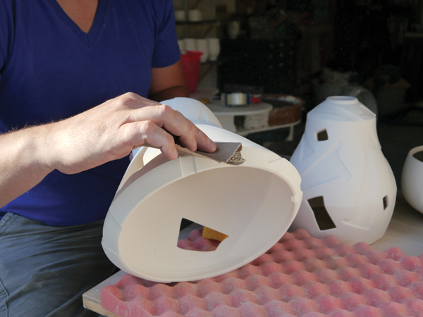 10 After bisque firing the piece, sand away any residual fingerprints or globs with wet/dry sand paper.