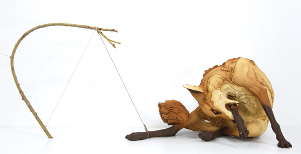 4 Trapped, 37 in. (94 cm) in length, stoneware, paint, 18k gold, rope, wood, 2015.