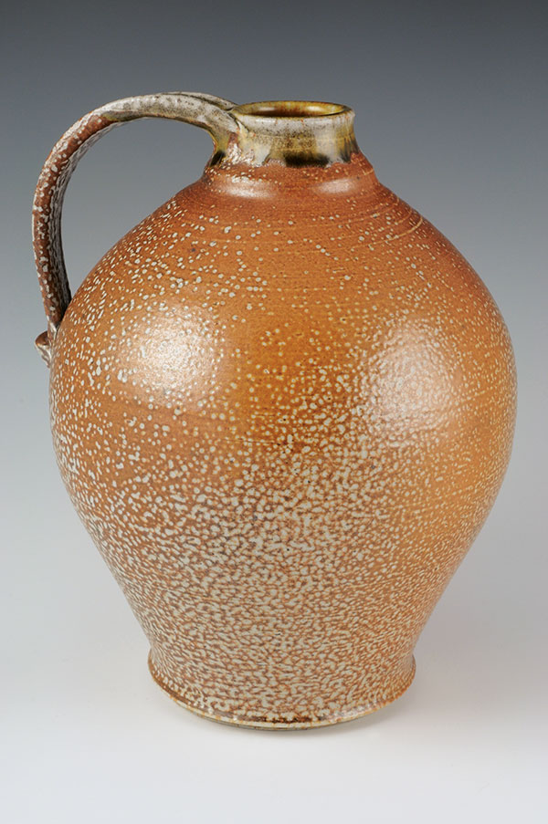Salt-fired stoneware jug, 11 in. (28 cm) in diameter, stoneware clay, Blair’s red slip on shoulder, iron-rutile interior glaze, salt-fired to cone 10, 2017.