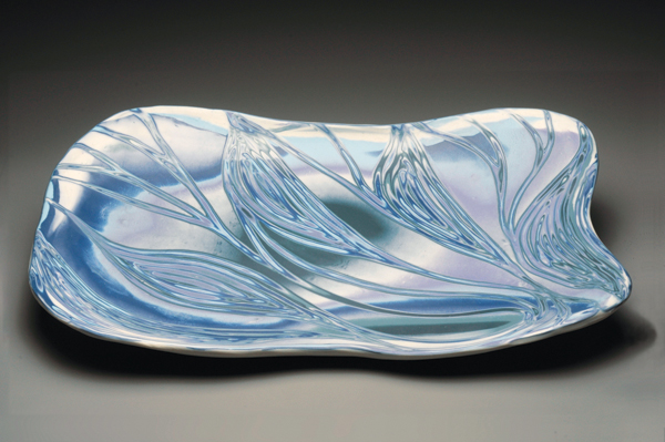 Curves and Waves platter, 16 in. (41 cm) in length, slab-built colored porcelain, fired to cone 10 in gas reduction, 2015. Photo: Charley Freiberg.