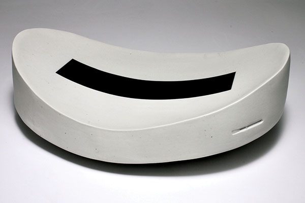 1 Mimi Logothetis’ Minus Platter, 16 in. (41 cm) in length, porcelain, fired to cone 10 in reduction. 