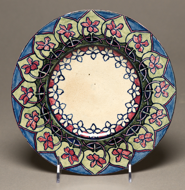 4 Margaret H. Shelby’s plate, 8 in. (20 cm) in diameter, Jules Gabry, potter; underglaze painting of Southern coast violet design, ca. 1896. Newcomb Art Collection, Tulane University, New Orleans, Louisiana.