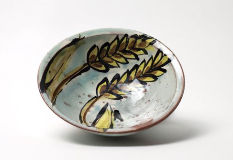 Shallow bowl, 6 in. (16 cm) in diameter, red earthenware, terra sigillata, slip, underglaze, glaze, fired to cone 03 in an electric kiln. Photo: Jacob Wiegmann.